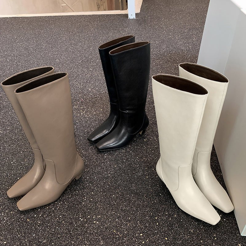 Below The Knee Tall Knight Boots $175.00 Dana Fashion Color: Beige Size: 34 Women's shoes Product information: Pattern: solid color Lining material: Leather Color: black, khaki, creamy-white Processing Method: paint surface Heel height: mid heel (3-5CM) S