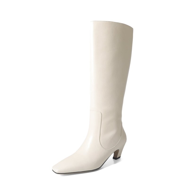 Below The Knee Tall Knight Boots $175.00 Dana Fashion Color: Beige Size: 34 Women's shoes Product information: Pattern: solid color Lining material: Leather Color: black, khaki, creamy-white Processing Method: paint surface Heel height: mid heel (3-5CM) S