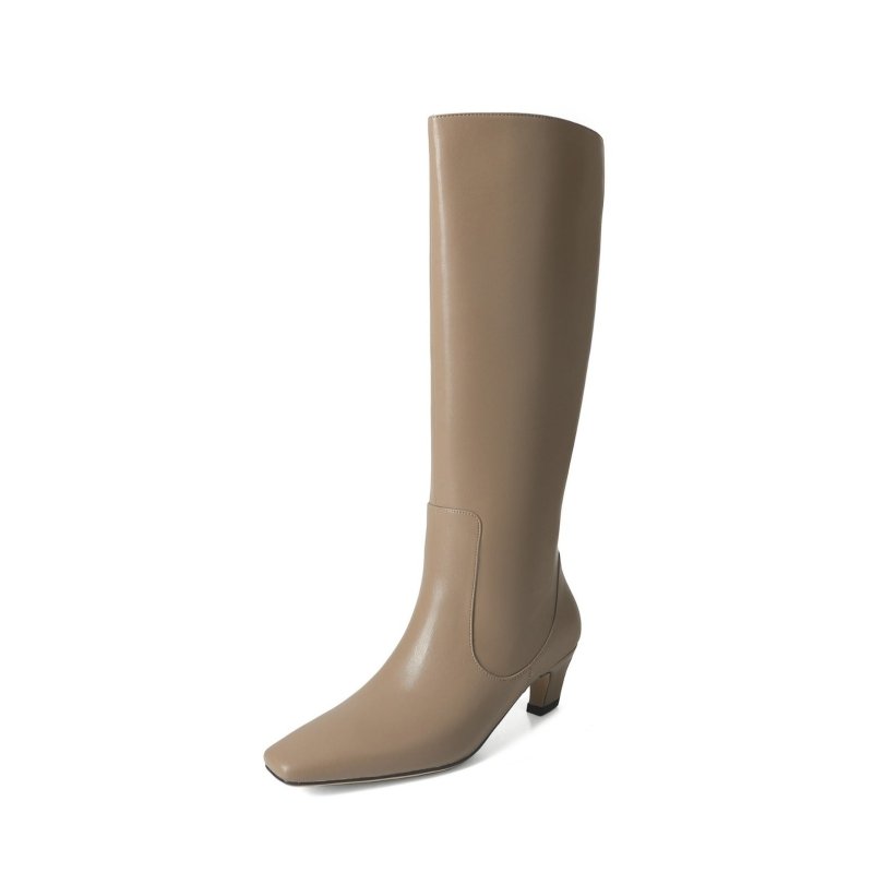 Below The Knee Tall Knight Boots $175.00 Dana Fashion Color: Beige Size: 34 Women's shoes Product information: Pattern: solid color Lining material: Leather Color: black, khaki, creamy-white Processing Method: paint surface Heel height: mid heel (3-5CM) S