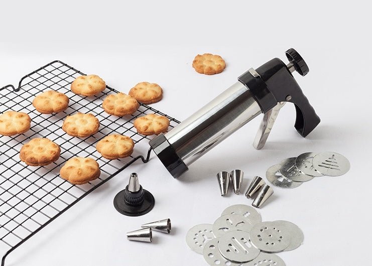 Biscuit Press Biscuit Machine $45.39 Dana Fashion style: Biscuit machine Dana's Kitchen Overview: Purpose: Bake cookies and decorate cakes Stainless steel cookie gun 1.100g butter, 130g low gluten flour, 50g white sugar without milk and other, other recip