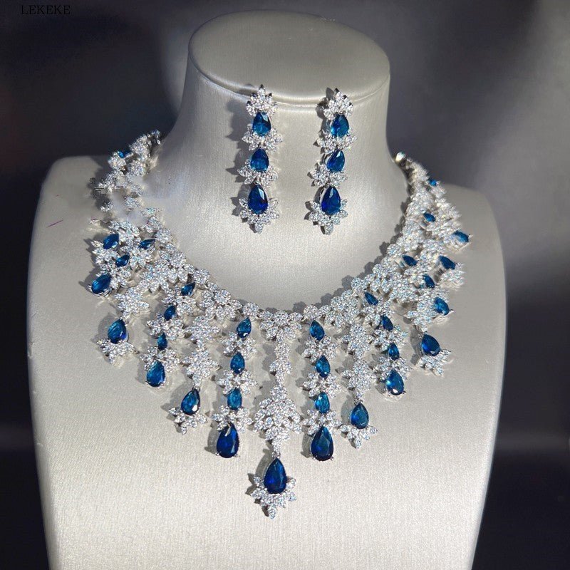 Blue Full Rhinestone Zircon Tassel Necklace Earring Bracelet Four-piece Set $350.50 Dana Fashion Color: Blue Women's Accessories Product information: Material: zircon/Rhinestone Product Type: Ornament Color classification: blue necklace earring bracelet r
