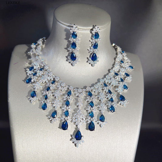 Blue Full Rhinestone Zircon Tassel Necklace Earring Bracelet Four-piece Set $350.50 Dana Fashion Color: Blue Women's Accessories Product information: Material: zircon/Rhinestone Product Type: Ornament Color classification: blue necklace earring bracelet r