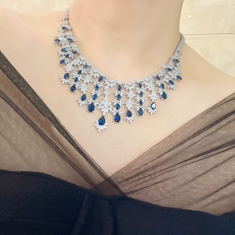 Blue Full Rhinestone Zircon Tassel Necklace Earring Bracelet Four-piece Set $350.50 Dana Fashion Color: Blue Women's Accessories Product information: Material: zircon/Rhinestone Product Type: Ornament Color classification: blue necklace earring bracelet r