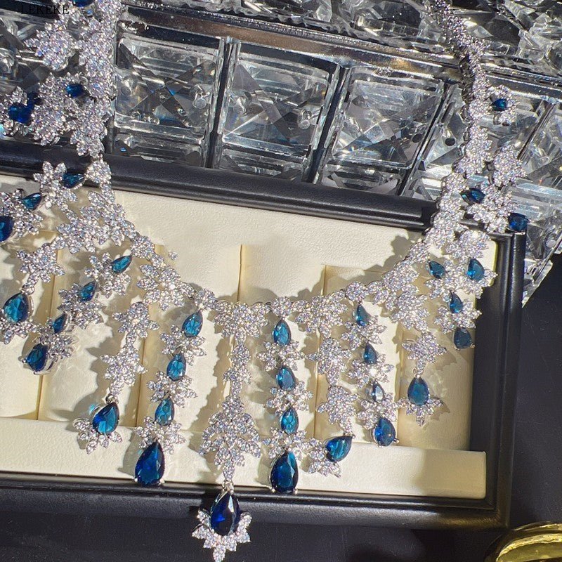Blue Full Rhinestone Zircon Tassel Necklace Earring Bracelet Four-piece Set $350.50 Dana Fashion Color: Blue Women's Accessories Product information: Material: zircon/Rhinestone Product Type: Ornament Color classification: blue necklace earring bracelet r