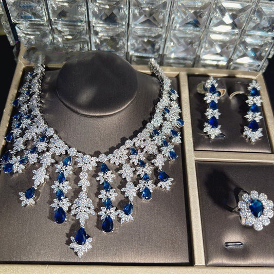 Blue Full Rhinestone Zircon Tassel Necklace Earring Bracelet Four-piece Set $350.50 Dana Fashion Color: Blue Women's Accessories Product information: Material: zircon/Rhinestone Product Type: Ornament Color classification: blue necklace earring bracelet r