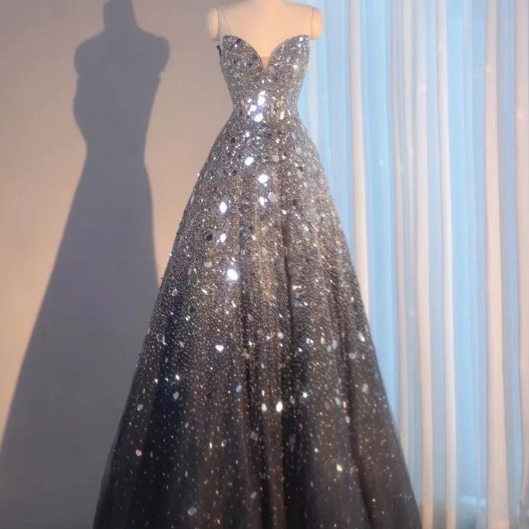 Blue Heavy Industry Wedding Evening Dress $999.99 Dana Fashion Color: Dark Blue Size: 2XL Women's clothing Product information : Color: dark blue Fabric: mesh cloth Beads: sequins Sleeve length: sleeveless Style: tube top type Size Information: Size S,M,L