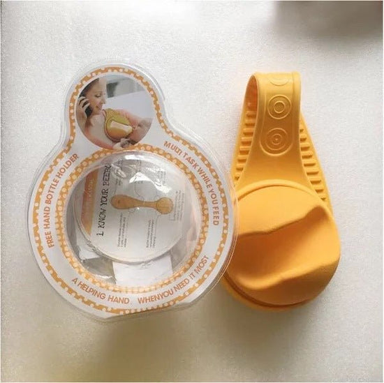 Bottle Holder The Hands Free Way To Feed Your Baby $39.93 Dana Fashion default: default Baby & Mother Features: Easy to use and easy to clean Rolls up neatly for easy storage or transport Lightweight, even with a full bottle Soft and flexible for a secure