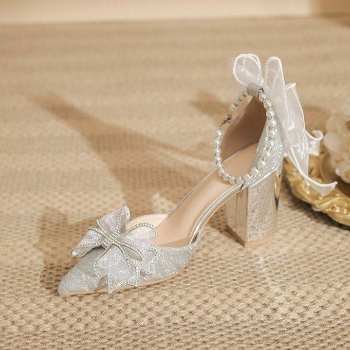 Bow Beaded Pointed Low-cut High Heels $49.90 Dana Fashion Color: Silver 6cm Size: 34 Women's shoes Product information: Pattern: solid color Lining material: Microfiber Color: Silver 6cm, silver 8cm Upper height: low top Heel height: mid heel (3-5CM) Heel