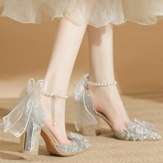 Bow Beaded Pointed Low-cut High Heels $49.90 Dana Fashion Color: Silver 6cm Size: 34 Women's shoes Product information: Pattern: solid color Lining material: Microfiber Color: Silver 6cm, silver 8cm Upper height: low top Heel height: mid heel (3-5CM) Heel