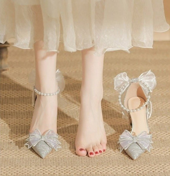 Bow Beaded Pointed Low-cut High Heels $49.90 Dana Fashion Color: Silver 6cm Size: 34 Women's shoes Product information: Pattern: solid color Lining material: Microfiber Color: Silver 6cm, silver 8cm Upper height: low top Heel height: mid heel (3-5CM) Heel