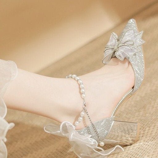Bow Beaded Pointed Low-cut High Heels $49.90 Dana Fashion Color: Silver 6cm Size: 34 Women's shoes Product information: Pattern: solid color Lining material: Microfiber Color: Silver 6cm, silver 8cm Upper height: low top Heel height: mid heel (3-5CM) Heel