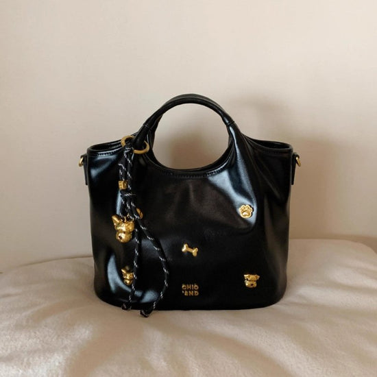 Bread Puppy Tote Bag Women's Portable Shoulder Messenger Bag $74.86 Dana Fashion Color: Black Baby & Mother Product information: Lining texture: Polyester Color: Black Hardness: medium and soft Material: PU Suitcase shape: square vertical model Number of