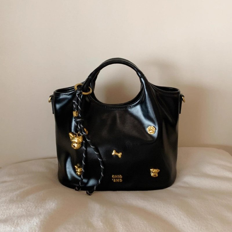 Bread Puppy Tote Bag Women's Portable Shoulder Messenger Bag $74.86 Dana Fashion Color: Black Baby & Mother Product information: Lining texture: Polyester Color: Black Hardness: medium and soft Material: PU Suitcase shape: square vertical model Number of
