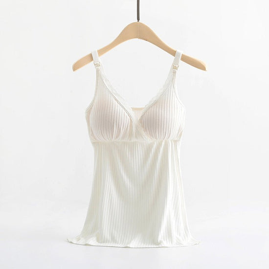 Breast feeding vest with cross elastic bra $19.41 Dana Fashion Color: White Size: 3XL Baby & Mother Fabric name: Modal Main fabric composition: cotton Main fabric ingredient content 95 (%) Product category camisole 1. Asian sizes are 1 to 2 sizes smaller