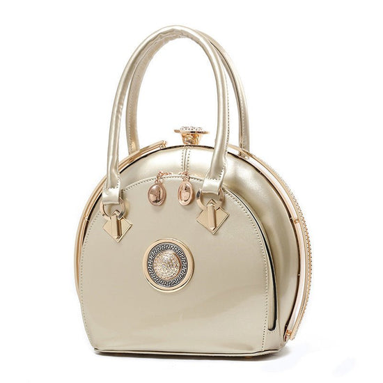 Bright leather high-end handbags noble fashion trend $79.00 Dana Fashion Color: Golden Women's Bags Style: Korean Style; women's handbag Fabric texture; PU Lining texture; polyester cotton Bag shape; shell type Trendy styles of luggage; lock bag Opening m