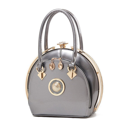 Bright leather high-end handbags noble fashion trend $79.00 Dana Fashion Color: Black Women's Bags Style: Korean Style; women's handbag Fabric texture; PU Lining texture; polyester cotton Bag shape; shell type Trendy styles of luggage; lock bag Opening me