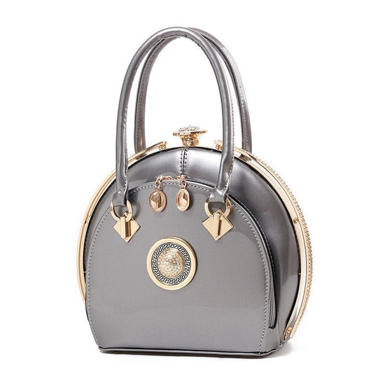 Bright leather high-end handbags noble fashion trend $79.00 Dana Fashion Color: Black Women's Bags Style: Korean Style; women's handbag Fabric texture; PU Lining texture; polyester cotton Bag shape; shell type Trendy styles of luggage; lock bag Opening me