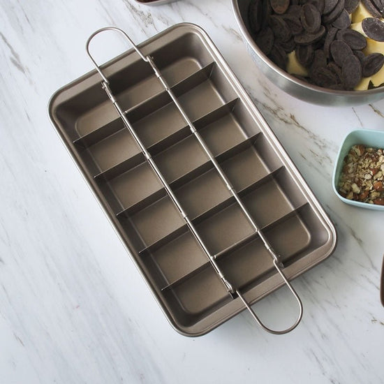 Brownie Baking Pan Cake Mould Square Bread Baking $44.58 Dana Fashion Color: Silver Dana's Kitchen Product Name: Checkered Brownie Baking Pan Size: length 31 * width 20 * height 4.9cm Thickness: 0.7mm Material: High carbon steel + European standard new Te