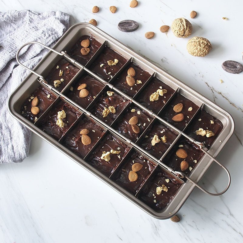 Brownie Baking Pan Cake Mould Square Bread Baking $44.58 Dana Fashion Color: Silver Dana's Kitchen Product Name: Checkered Brownie Baking Pan Size: length 31 * width 20 * height 4.9cm Thickness: 0.7mm Material: High carbon steel + European standard new Te