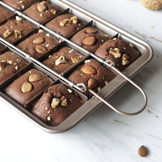 Brownie Baking Pan Cake Mould Square Bread Baking $44.58 Dana Fashion Color: Silver Dana's Kitchen Product Name: Checkered Brownie Baking Pan Size: length 31 * width 20 * height 4.9cm Thickness: 0.7mm Material: High carbon steel + European standard new Te