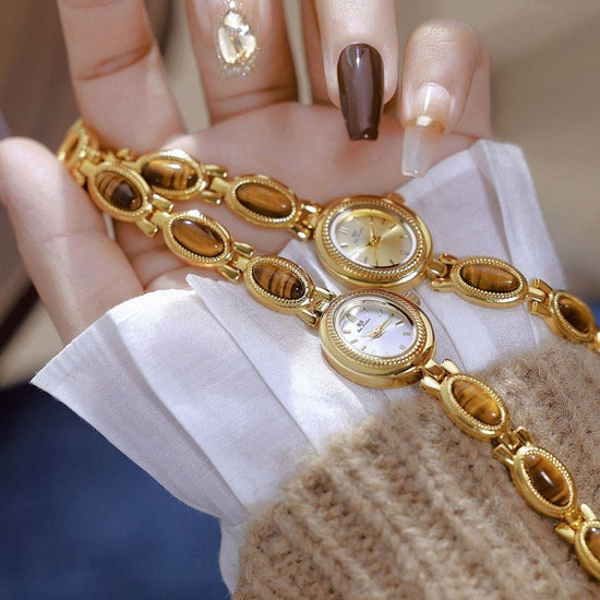 BS Gold Retro Rich Tigereye Chain Watch $25.00 Dana Fashion Color: Tiger Eye Champagne Gold Women's Accessories Product information: Color: Tiger Eye gold white, tiger eye champagne gold Thickness: 7mm Movement type: Quartz Dial diameter: 20*24 Crown type