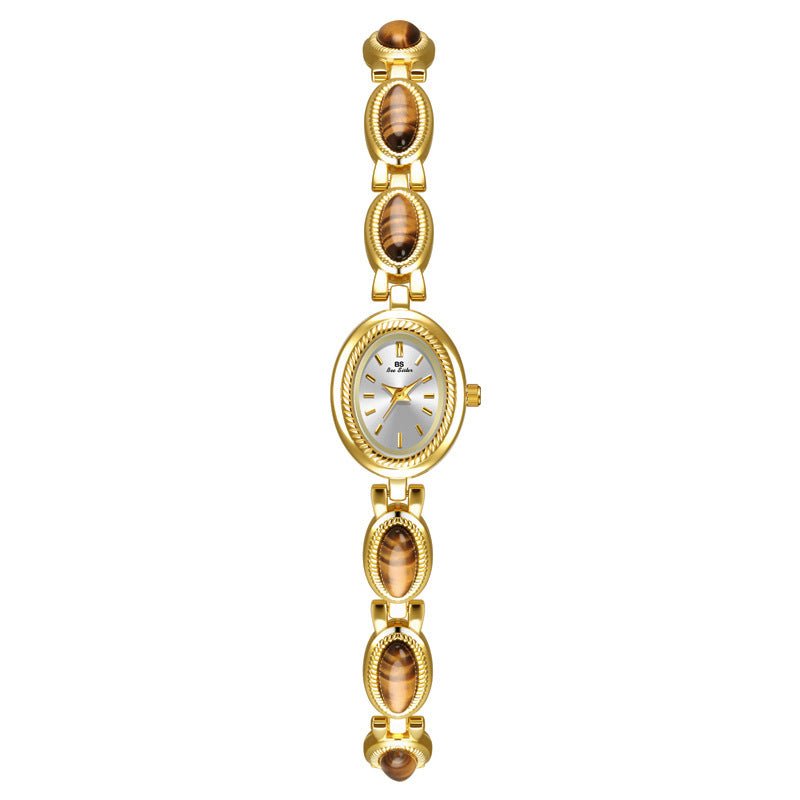 BS Gold Retro Rich Tigereye Chain Watch $25.00 Dana Fashion Color: Tiger Eye Gold White Women's Accessories Product information: Color: Tiger Eye gold white, tiger eye champagne gold Thickness: 7mm Movement type: Quartz Dial diameter: 20*24 Crown type: Sp