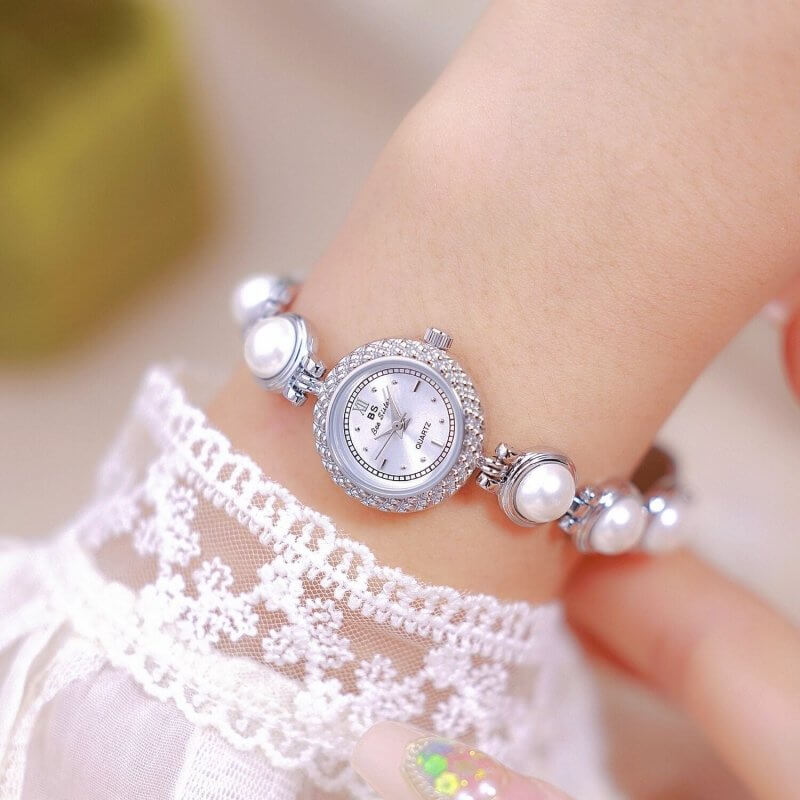BS New Light Luxury Pearl Bracelet Women's Watch $39.50 Dana Fashion Color: Champagne Gold Surface Women's Accessories Product information: Color: Gold White, classic silver, champagne gold surface Thickness: 7mm Packing specification: PVC bag Style: Fash