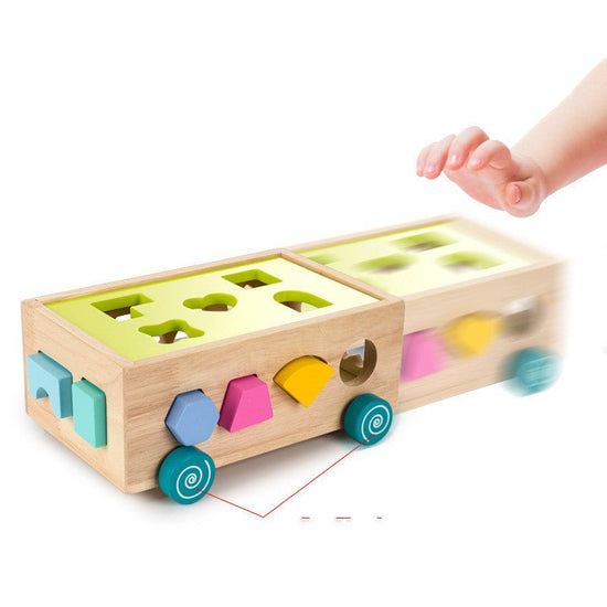 Building block toys for young children $65.14 Dana Fashion Color: Intellectual car Toys & Hobbies Geometric Shape Sorter On Wheels ●Wooden shape sorter on wheels ●Geometric cubes, shape sorter that is for fun play. ●Montessori style learning shapes and co