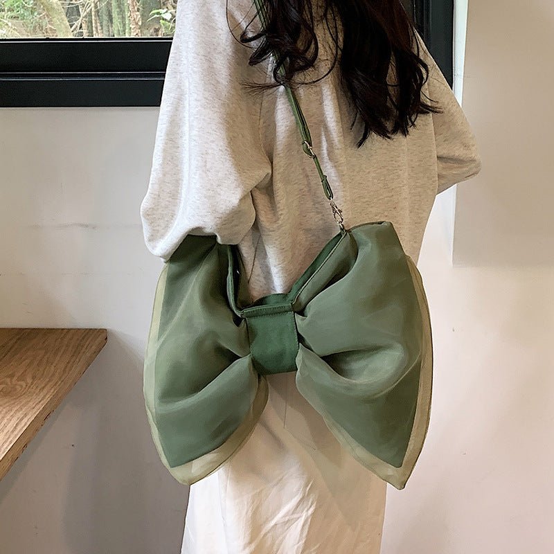 Butterfly Knot Personalized Shoulder Crossbody Bag $35.00 Dana Fashion Color: Black Size: No Specifications Women's Bags Product information: Lining texture: Polyester Applicable scenario: leisure travel Color: black, white, green Hardness: soft Size: no