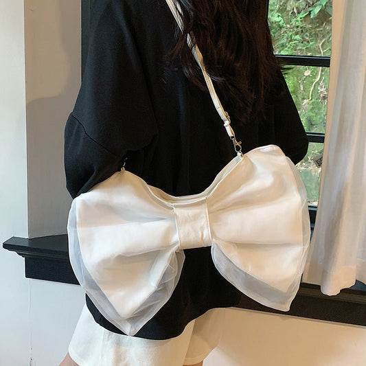 Butterfly Knot Personalized Shoulder Crossbody Bag $35.00 Dana Fashion Color: Black Size: No Specifications Women's Bags Product information: Lining texture: Polyester Applicable scenario: leisure travel Color: black, white, green Hardness: soft Size: no