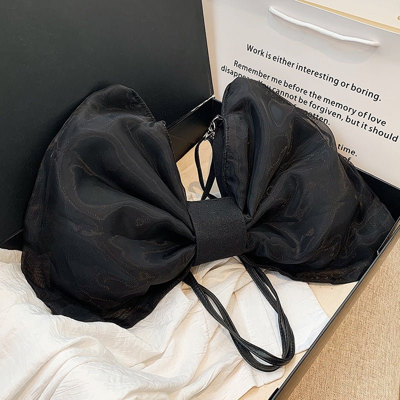 Butterfly Knot Personalized Shoulder Crossbody Bag $35.00 Dana Fashion Color: Black Size: No Specifications Women's Bags Product information: Lining texture: Polyester Applicable scenario: leisure travel Color: black, white, green Hardness: soft Size: no