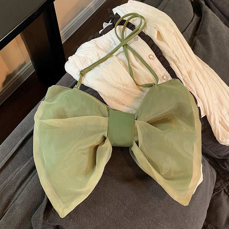 Butterfly Knot Personalized Shoulder Crossbody Bag $35.00 Dana Fashion Color: Black Size: No Specifications Women's Bags Product information: Lining texture: Polyester Applicable scenario: leisure travel Color: black, white, green Hardness: soft Size: no
