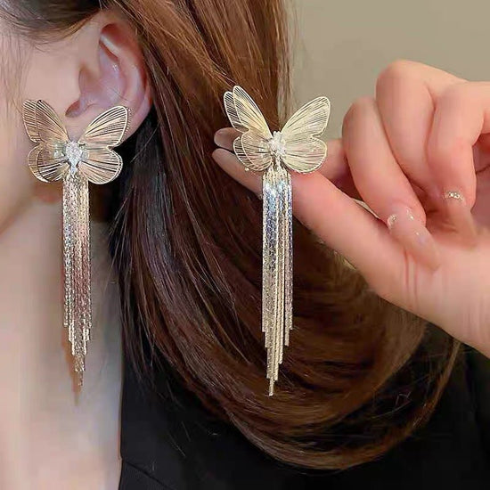 Butterfly Tassel Niche Creative Stud Earrings $14.62 Dana Fashion Color: EZ5472baik Women's Accessories Product information: Treatment Process: Electroplating Color: EZ5472baik,EZ5472jinse Applicable population: Female Material: Alloy Shape: Bow Popular e