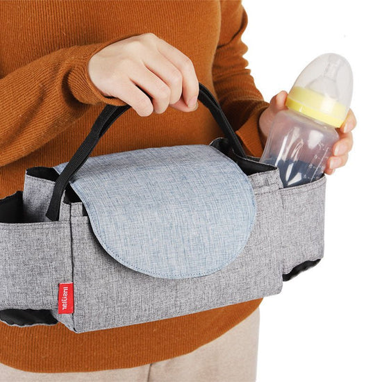 Cart storage bag $105.66 Dana Fashion Color: Black Baby & Mother Material: 300 cation +210D polyester Size: 21X12X12cm Weight: 150 grams Color: blue, black, gray, red