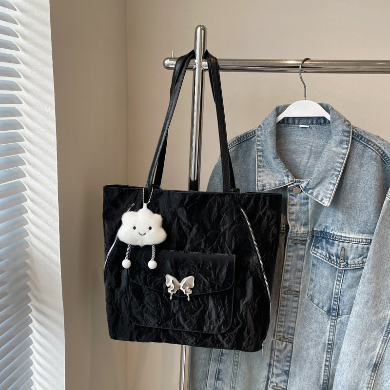 Cartoon Casual Solid Color Leather Shoulder Bag $29.31 Dana Fashion Color: Black Size: With Pendant Women's Bags Product information: Lining texture: synthetic leather Color: black, cream white, blue, silver, pink Outer bag type: Pocket Sandwich Hardness: