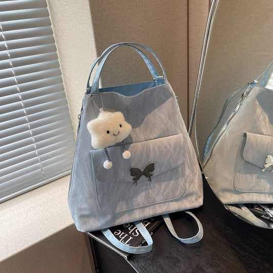 Cartoon Casual Solid Color Leather Shoulder Bag $29.31 Dana Fashion Color: Beige Size: With Pendant Women's Bags Product information: Lining texture: synthetic leather Color: black, cream white, blue, silver, pink Outer bag type: Pocket Sandwich Hardness:
