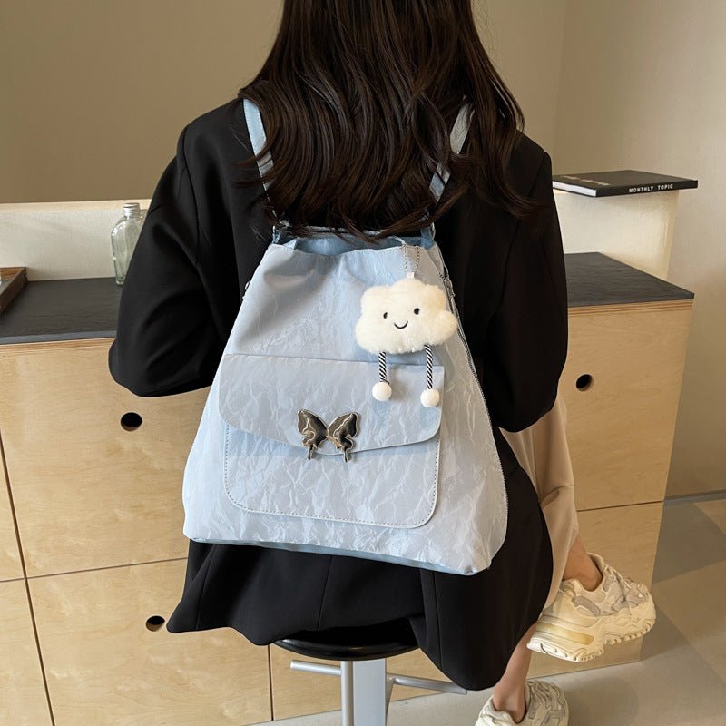 Cartoon Casual Solid Color Leather Shoulder Bag $29.31 Dana Fashion Color: Beige Size: With Pendant Women's Bags Product information: Lining texture: synthetic leather Color: black, cream white, blue, silver, pink Outer bag type: Pocket Sandwich Hardness: