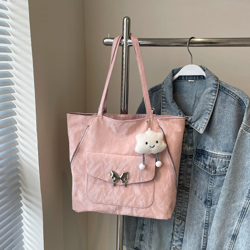Cartoon Casual Solid Color Leather Shoulder Bag $29.31 Dana Fashion Color: Pink Size: With Pendant Women's Bags Product information: Lining texture: synthetic leather Color: black, cream white, blue, silver, pink Outer bag type: Pocket Sandwich Hardness: