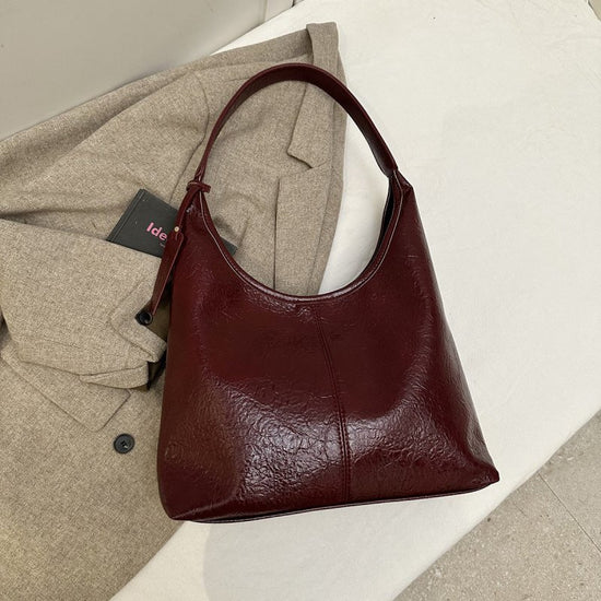 Casual Simple Easy Matching Tote Bag $43.50 Dana Fashion Color: Red Women's Bags Product information: Lining texture: Polyester Color: black, brown, red, brown Material: PU Package internal structure: mobile phone bag Popular elements: sewing thread Size: