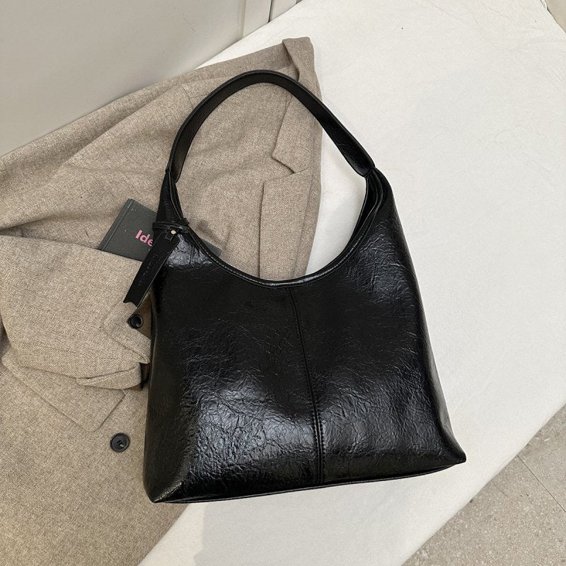 Casual Simple Easy Matching Tote Bag $43.50 Dana Fashion Color: Black Women's Bags Product information: Lining texture: Polyester Color: black, brown, red, brown Material: PU Package internal structure: mobile phone bag Popular elements: sewing thread Siz