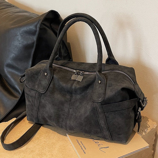 Casual Versatile Large Capacity Shoulder Messenger Bag $49.00 Dana Fashion Color: Black Women's Bags Product information: Applicable Gender: Female Pattern: solid color Applicable scenario: leisure travel Color: khaki, Black Material: Pu Style: street tre