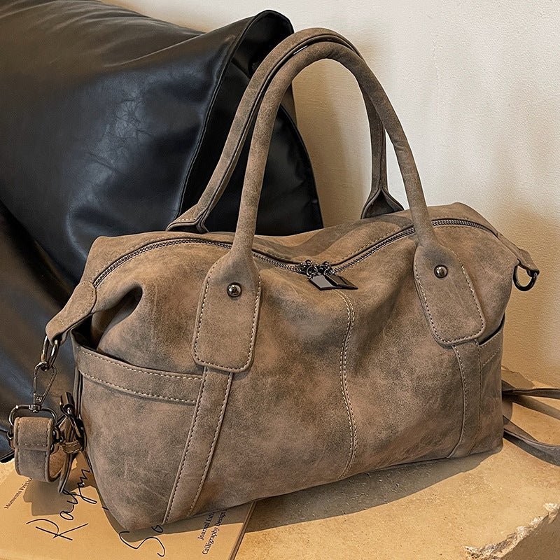 Casual Versatile Large Capacity Shoulder Messenger Bag $49.00 Dana Fashion Color: Black Women's Bags Product information: Applicable Gender: Female Pattern: solid color Applicable scenario: leisure travel Color: khaki, Black Material: Pu Style: street tre