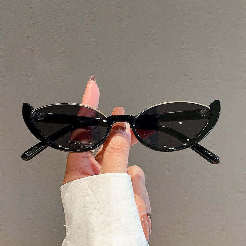 Cat Eye Sunglasses Women European And American Fashion Trending $15.52 Dana Fashion Color: Black Frame Gray Piece Women's Accessories Product information: Applicable scenarios: sun protection, fashion wear, stage performance, party gathering Color: Black