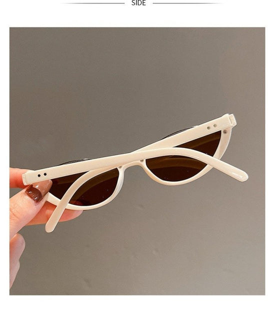 Cat Eye Sunglasses Women European And American Fashion Trending $15.52 Dana Fashion Color: Beige Frame Dried Women's Accessories Product information: Applicable scenarios: sun protection, fashion wear, stage performance, party gathering Color: Black Frame