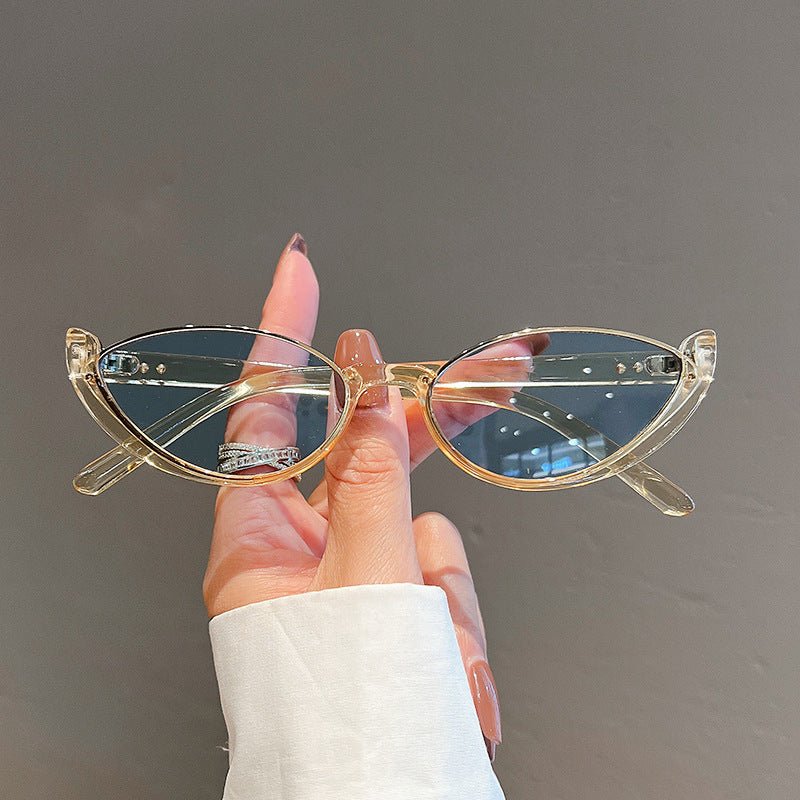 Cat Eye Sunglasses Women European And American Fashion Trending $15.52 Dana Fashion Color: Transparent Yellow Frame Blue Women's Accessories Product information: Applicable scenarios: sun protection, fashion wear, stage performance, party gathering Color:
