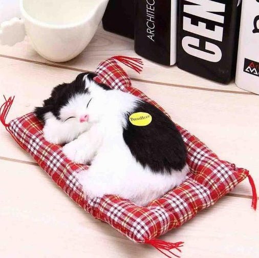 Cat Sleeping Doll With Meow Sound $18.11 Dana Fashion Color: Blackwhite Toys & Hobbies SIZE :17*14CM When you press the logo on your stomach, you will make a squeaking sound. It is dynamic, lifelike, soft and comfortable. Strong anti-destructive ability,