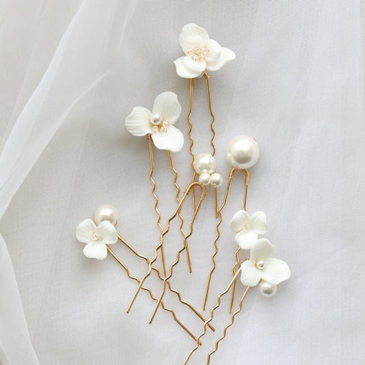 Ceramic Flower Pearl Embellished Bridal Hairpin Hair Plug Simple Hair Accessories $18.50 Dana Fashion Color: A Pair Of Gold Earrings Women's Accessories Product information: Style: Women's Color: gold one set, silver one set, gold earrings one pair (auric