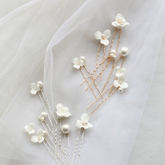 Ceramic Flower Pearl Embellished Bridal Hairpin Hair Plug Simple Hair Accessories $18.50 Dana Fashion Color: A Pair Of Gold Earrings Women's Accessories Product information: Style: Women's Color: gold one set, silver one set, gold earrings one pair (auric
