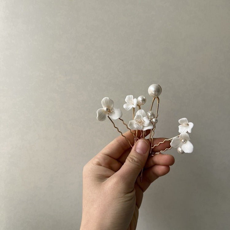 Ceramic Flower Pearl Embellished Bridal Hairpin Hair Plug Simple Hair Accessories $18.50 Dana Fashion Color: A Pair Of Gold Earrings Women's Accessories Product information: Style: Women's Color: gold one set, silver one set, gold earrings one pair (auric