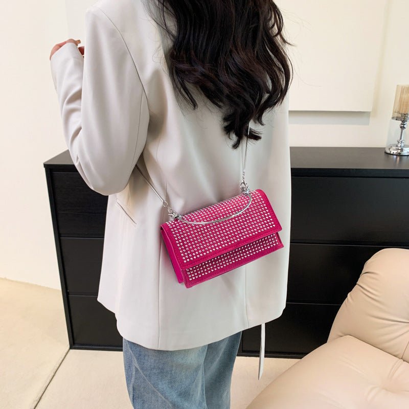 Chain Shoulder Bag Trendy Simple $25.00 Dana Fashion Color: Black Women's Bags Product information: Lining texture: synthetic leather Applicable scenarios: Daily matching Color: black, silver, Rose Red, colorful, pink, purple Outer bag type: Sandwich pock